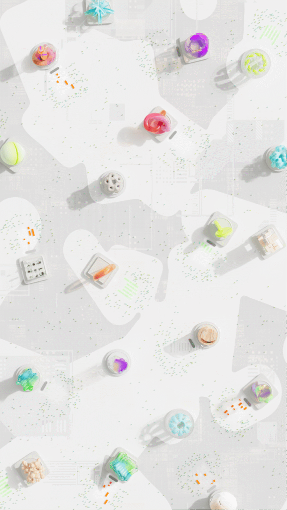 Creative flat lay of vibrant 3D objects on a white backdrop.